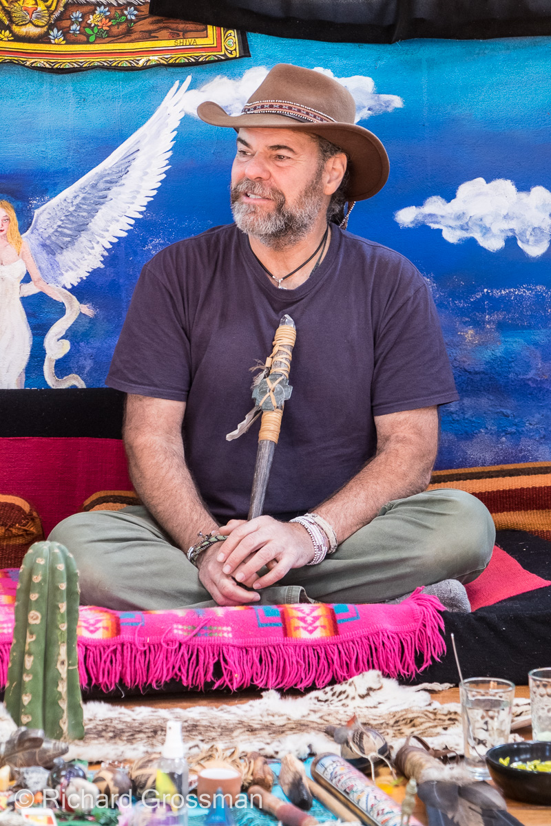 Richard Grossman seated in a ceremonial setting